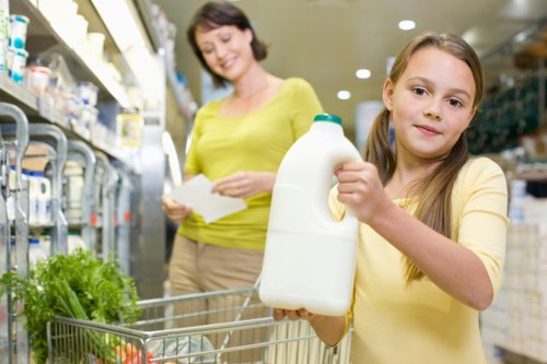 Girl Holding Gallon of Milk