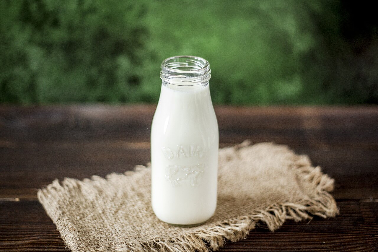 glass of milk in a bottle