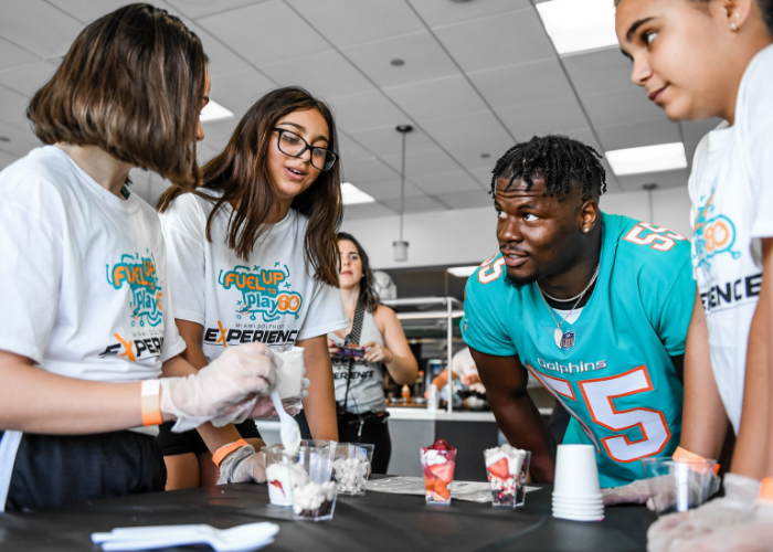 image of student talking to Jerome Baker