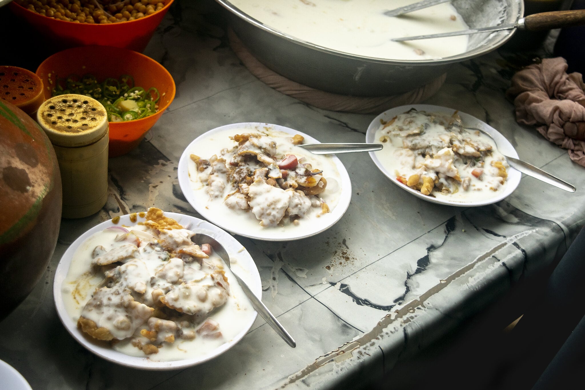 dahi yogurt sauce on a meat dish